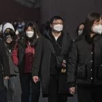 China Tangguhkan Akun Media yang Kritik Kebijakan COVID-19