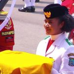 Fakta-Fakta Lilly Wenda, Sepatu Copot saat Jadi Pembawa Baki di Istana Negara